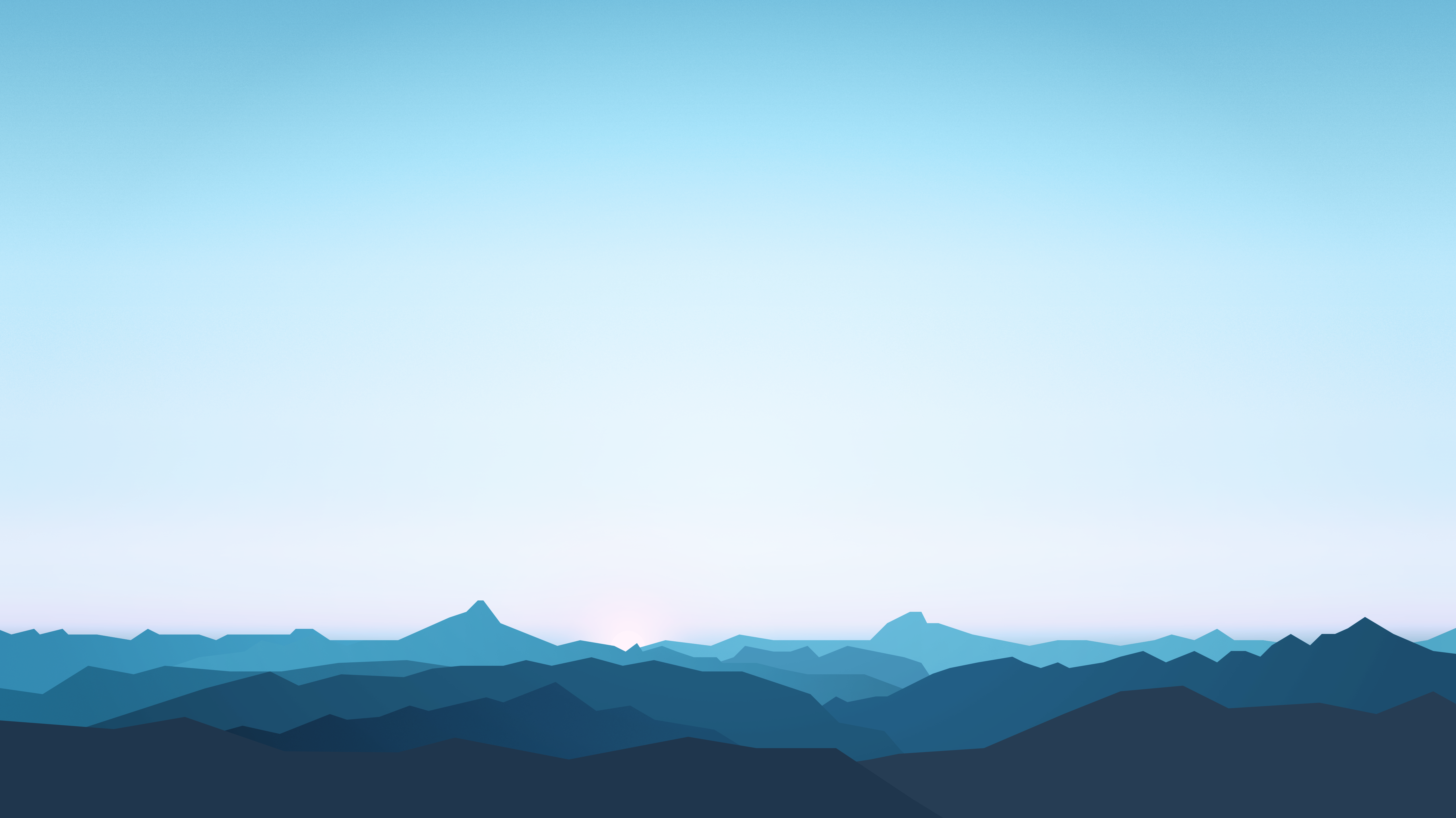 a_blue_sky_over_a_mountain_range.png